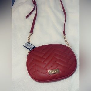 Brand new red Bebe purse.